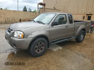 2004 Nissan Frontier XE Desert Runner z VIN 1N6ED26T84C448365, wystawiony jako Copart lot #56487435 z przebiegiem 266 738 mil mil oraz Tytuł czysty. Historia ofert i sprzedaży dostępna na DreamBid. Obrazek 1.