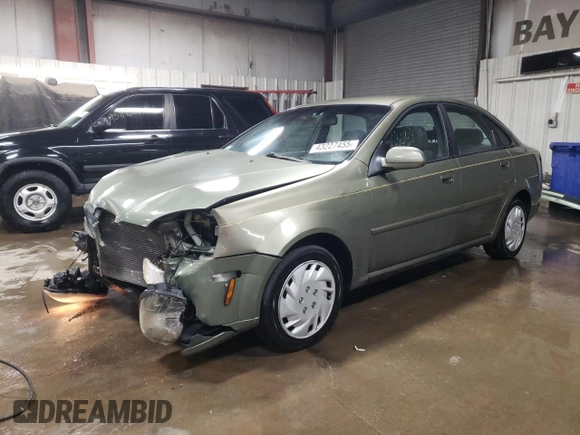 2004 Suzuki Forenza S z VIN KL5JD52Z14K975804, wystawiony jako Copart lot #43227455 z przebiegiem 114 726 mil mil oraz Szkody całkowita. Historia ofert i sprzedaży dostępna na DreamBid. Obrazek 1.