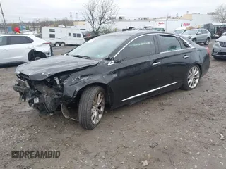 2014 Cadillac XTS Luxury with VIN 2G61M5S36E9248122, listed as a IAAI auction lot 42012167 with 188,458 mi miles and . Bid and sale history available at DreamBid. Image 2.