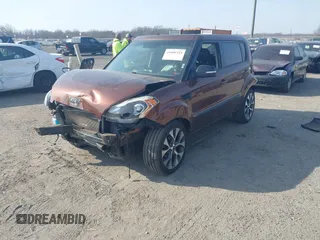 2012 Kia Soul + with VIN KNDJT2A6XC7422394, listed as a IAAI auction lot 41806315 with 165,268 mi miles. Bid and sale history available at carsss.com. Image 2.