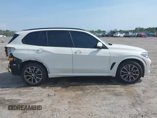 2021 BMW X5 xDrive45e with VIN 5UXTA6C08M9F38909, listed as a IAAI auction lot 42172536 with 71,741 mi miles and . Bid and sale history available at DreamBid. Image 14.