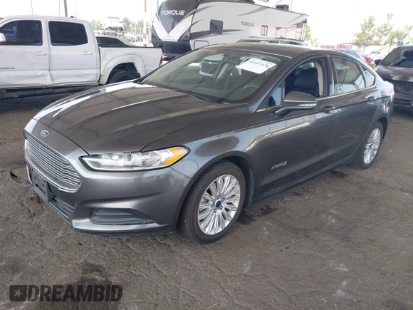 2015 Ford Fusion SE Hybrid with VIN 3FA6P0LU6FR309099, listed as a IAAI auction lot 42497429 with 157,631 mi miles and . Bid and sale history available at DreamBid. Image 2.