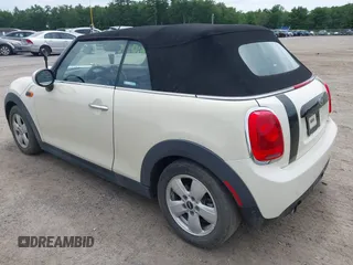 2019 MINI Convertible Cooper z VIN WMWWG5C52K3F79780, wystawiony jako IAAI lot #42622429 z przebiegiem 38 532 mil mil oraz . Historia ofert i sprzedaży dostępna na DreamBid. Obrazek 3.