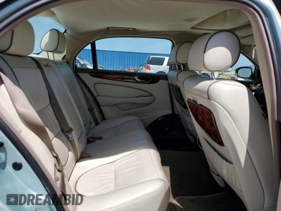 2005 Jaguar XJ Vanden Plas z VIN SAJWA82CX5SG35644, wystawiony jako Copart lot #49029245 z przebiegiem 88 771 mil mil oraz Szkoda całkowita • Salvage title. Historia ofert i sprzedaży dostępna na DreamBid. Obrazek 10.
