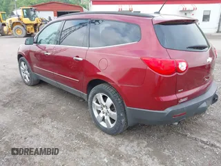 2011 Chevrolet Traverse LTZ with VIN 1GNKVLED6BJ182170, listed as a IAAI auction lot 42230085 with 152,506 mi miles and . Bid and sale history available at DreamBid. Image 3.