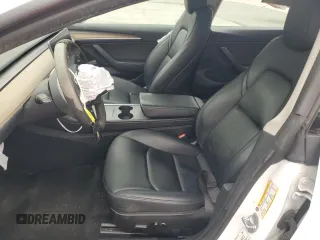 2023 Tesla Model 3 z VIN 5YJ3E1EA1PF561521, wystawiony jako Copart lot #55637855 z przebiegiem 83 008 mil mil oraz Szkoda całkowita • Salvage title. Historia ofert i sprzedaży dostępna na DreamBid. Obrazek 7.