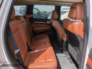 2012 Jeep Grand Cherokee Overland with VIN 1C4RJFCG9CC199486, listed as a Copart auction lot 51942135 with 113,098 mi miles and Salvage Title. Bid and sale history available at carsss.com. Image 10.