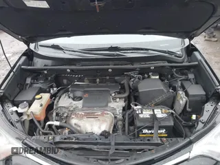 2018 Toyota RAV4 LE with VIN 2T3BFREV2JW788700, listed as a IAAI auction lot 41986212 with 87,704 mi miles. Bid and sale history available at carsss.com. Image 10.