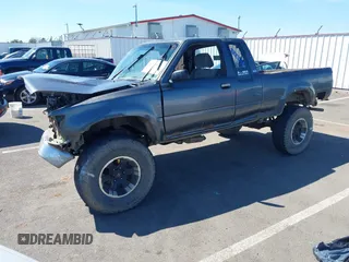 1990 Toyota Pickup SR5 z VIN JT4VN13G7L5019822, wystawiony jako IAAI lot #42194555 z przebiegiem 255 628 mil mil oraz . Historia ofert i sprzedaży dostępna na DreamBid. Obrazek 2.