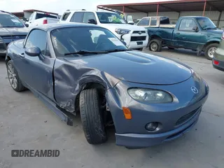 2008 Mazda MX-5 Miata Touring with VIN JM1NC26F580156079, listed as a IAAI auction lot 42543666 with 131,557 mi miles and . Bid and sale history available at DreamBid. Image 1.