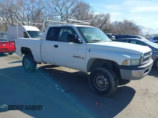 2002 Dodge Ram 2500 with VIN 3B7KF23Z82M280490, listed as a IAAI auction lot 41664001 with 167,744 mi miles. Bid and sale history available at carsss.com. Image 1.