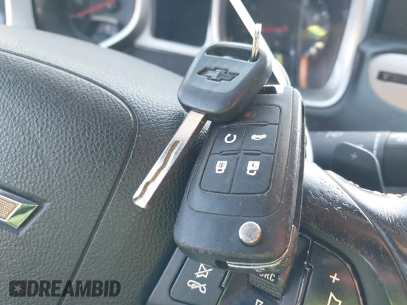 2014 Chevrolet Camaro LT z VIN 2G1FB1E35E9126793, wystawiony jako IAAI lot #41959896 z przebiegiem Nie podano mil oraz . Historia ofert i sprzedaży dostępna na DreamBid. Obrazek 11.