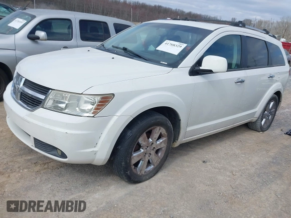 2009 Dodge Journey R/T with VIN 3D4GH67V99T169786, listed as a IAAI auction lot 41708329 with 131,556 mi miles and . Bid and sale history available at DreamBid. Image 2.