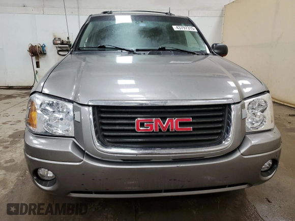 2005 GMC Envoy SLE with VIN 1GKDS13S952383743, listed as a Copart auction lot 43797315 with 185,833 mi miles and Salvage title. Bid and sale history available at DreamBid. Image 5.