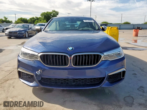 2020 BMW 5 Series M550i xDrive with VIN WBAJS7C09LCE06865, listed as a Copart auction lot 60140955 with Not provided miles and Salvage title. Bid and sale history available at DreamBid. Image 5.