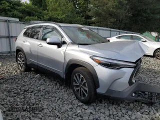 2023 Toyota Corolla Cross XLE with VIN 7MUDAABG6PV078570, listed as a Copart auction lot 65246535 with 21,928 mi miles and Salvage title. Bid and sale history available at DreamBid. Image 4.