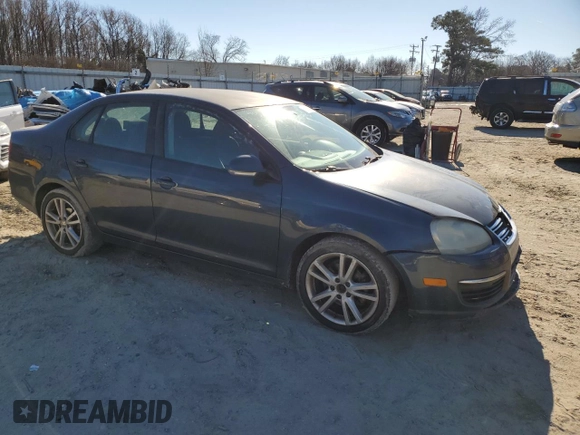 2010 Volkswagen Jetta S with VIN 3VWJX7AJ8AM007693, listed as a Copart auction lot 86056024 with 198,492 mi miles and Salvage title. Bid and sale history available at DreamBid. Image 4.