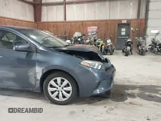 2015 Toyota Corolla L with VIN 2T1BURHE9FC356561, listed as a IAAI auction lot 42224561 with 121,288 mi miles and . Bid and sale history available at DreamBid. Image 16.