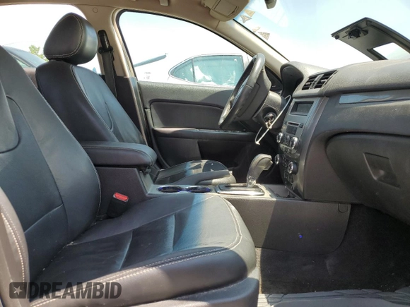2012 Ford Fusion SEL with VIN 3FAHP0JA1CR219369, listed as a Copart auction lot 58430855 with 175,922 mi miles and Salvage title. Bid and sale history available at DreamBid. Image 7.