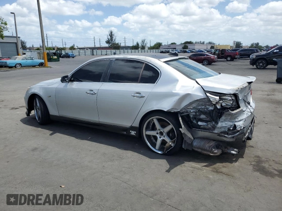 2005 BMW 5 Series 530i with VIN WBANA73505CR59646, listed as a Copart auction lot 55264865 with 187,911 mi miles and Salvage title. Bid and sale history available at DreamBid. Image 2.