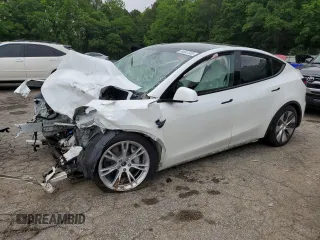 2024 Tesla Model Y Long Range с VIN 7SAYGDEE5RA235339, выставлен на аукционе Copart как лот 54841335 с пробегом Не указан миль и Списание • Salvage title. История ставок и продаж доступна на DreamBid. Изображение 1.