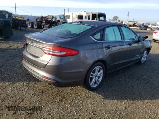 2018 Ford Fusion Hybrid SE with VIN 3FA6P0LUXJR165243, listed as a Copart auction lot 72653682 with 52,880 mi miles. Bid and sale history available at carsss.com. Image 3.
