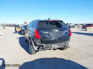 2017 Cadillac XT5 FWD with VIN 1GYKNARS3HZ122969, listed as a IAAI auction lot 41421230 with 116,603 mi miles. Bid and sale history available at carsss.com. Image 6.