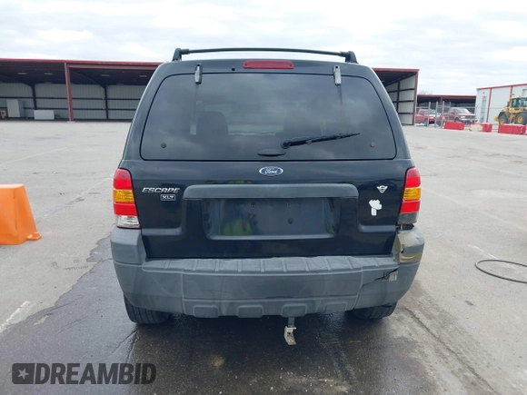 2005 Ford Escape XLT with VIN 1FMCU03135KB37656, listed as a IAAI auction lot 41908207 with 191,899 mi miles. Bid and sale history available at carsss.com. Image 16.