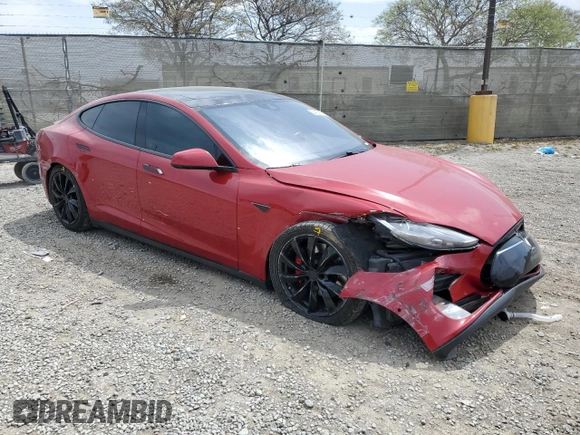 2016 Tesla Model S 90D with VIN 5YJSA1E42GF127593, listed as a Copart auction lot 52450495 with 144,151 mi miles and Salvage title. Bid and sale history available at DreamBid. Image 4.