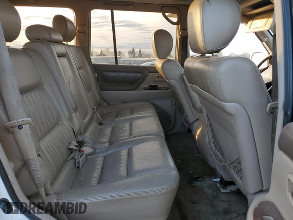 2000 Toyota Land Cruiser z VIN JT3HT05J0Y0122711, wystawiony jako Copart lot #86929954 z przebiegiem Nie podano mil oraz Czysty tytuł • Clean title. Historia ofert i sprzedaży dostępna na DreamBid. Obrazek 11.