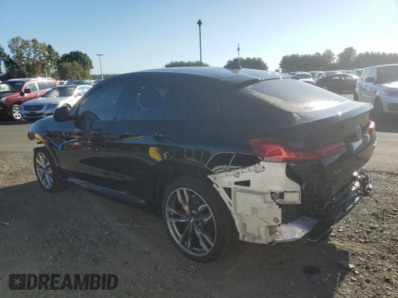 2021 BMW X4 M40i with VIN 5UX2V5C05M9H59295, listed as a Copart auction lot 71312963 with 31,050 mi miles. Bid and sale history available at carsss.com. Image 2.