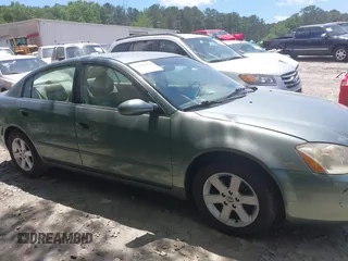 2002 Nissan Altima S z VIN 1N4AL11D02C147963, wystawiony jako IAAI lot #42318252 z przebiegiem 203 894 mil mil oraz . Historia ofert i sprzedaży dostępna na DreamBid. Obrazek 13.
