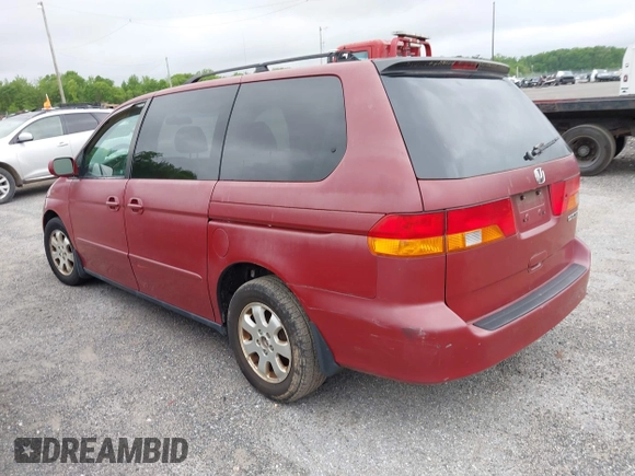 2002 Honda Odyssey EX-L z VIN 2HKRL18092H572036, wystawiony jako IAAI lot #42122713 z przebiegiem Nie podano mil oraz . Historia ofert i sprzedaży dostępna na DreamBid. Obrazek 3.