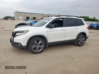 2020 Honda Passport Touring with VIN 5FNYF7H97LB000127, listed as a Copart auction lot 57613775 with 68,851 mi miles and Salvage title. Bid and sale history available at DreamBid. Image 1.
