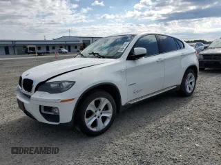 2014 BMW X6 xDrive35i z VIN 5UXFG2C53E0C42900, wystawiony jako Copart lot #55641745 z przebiegiem 156 045 mil mil oraz Tytuł czysty. Historia ofert i sprzedaży dostępna na DreamBid. Obrazek 1.