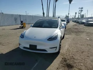 2022 Tesla Model Y Long Range with VIN 7SAYGDEE1NF339663, listed as a Copart auction lot 49771965 with 33,734 mi miles and Salvage Title. Bid and sale history available at carsss.com. Image 10.