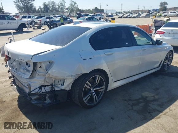 2019 BMW 7 Series 740i with VIN WBA7E2C53KB454816, listed as a IAAI auction lot 42539294 with 73,363 mi miles and . Bid and sale history available at DreamBid. Image 4.
