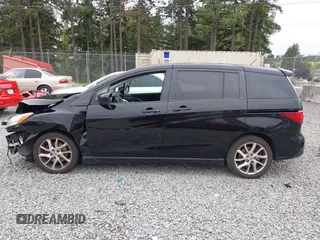 2012 Mazda 5 Grand Touring with VIN JM1CW2DL9C0112005, listed as a IAAI auction lot 42680646 with 140,724 mi miles and . Bid and sale history available at DreamBid. Image 14.