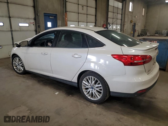 2015 Ford Focus Titanium с VIN 1FADP3J28FL385528, выставлен на аукционе Copart как лот 50628395 с пробегом 92 323 миль миль и На запчасти • Non repairable. История ставок и продаж доступна на DreamBid. Изображение 2.
