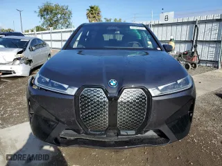 2023 BMW iX xDrive50 with VIN WB523CF02PCM92379, listed as a Copart auction lot 47726814 with 7,721 mi miles. Bid and sale history available at carsss.com. Image 5.