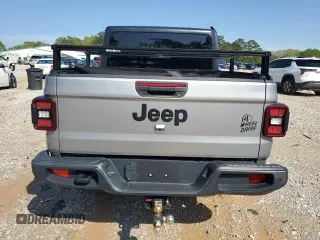 2021 Jeep Gladiator Sport S z VIN 1C6HJTAGXML513426, wystawiony jako Copart lot #58844025 z przebiegiem Nie podano mil oraz Szkody całkowita. Historia ofert i sprzedaży dostępna na DreamBid. Obrazek 6.