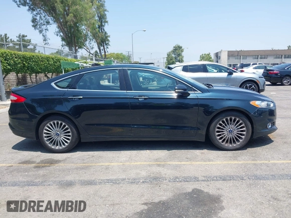 2014 Ford Fusion Titanium с VIN 3FA6P0K93ER177463, выставлен на аукционе IAAI как лот 42450617 с пробегом 173 064 миль миль и . История ставок и продаж доступна на DreamBid. Изображение 14.