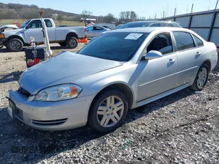 2014 Chevrolet Impala LT with VIN 2G1WB5E31E1184020, listed as a IAAI auction lot 41770355 with 135,367 mi miles and . Bid and sale history available at DreamBid. Image 2.