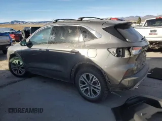 2021 Ford Escape SEL Hybrid z VIN 1FMCU9CZ9MUA86970, wystawiony jako Copart lot #84290064 z przebiegiem 32 019 mil mil oraz Szkoda całkowita • Salvage title. Historia ofert i sprzedaży dostępna na DreamBid. Obrazek 2.