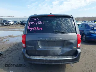 2019 Dodge Grand Caravan SXT with VIN 2C4RDGCG1KR514123, listed as a IAAI auction lot 41777811 with 119,087 mi miles and . Bid and sale history available at DreamBid. Image 17.