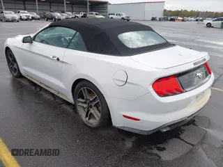 2020 Ford Mustang EcoBoost with VIN 1FATP8UH0L5137864, listed as a IAAI auction lot 41069174 with 86,556 mi miles and . Bid and sale history available at DreamBid. Image 3.