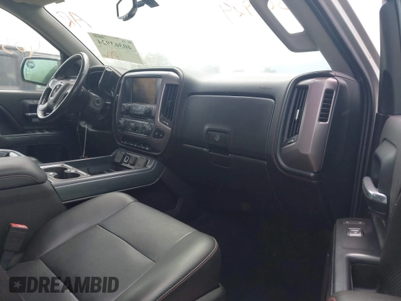2014 GMC Sierra 1500 SLT with VIN 3GTU2VEC2EG100051, listed as a IAAI auction lot 40363924 with 149,636 mi miles and . Bid and sale history available at DreamBid. Image 5.