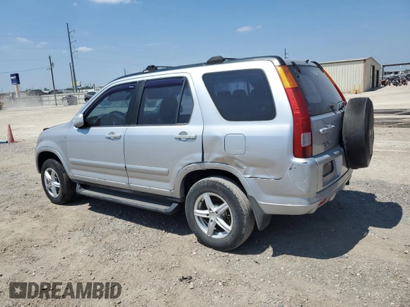 2002 Honda CR-V LX with VIN JHLRD68512C025394, listed as a Copart auction lot 67161964 with 143,660 mi miles and Salvage Title. Bid and sale history available at DreamBid. Image 2.