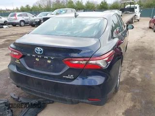 2021 Toyota Camry Hybrid LE with VIN 4T1C31AKXMU565585, listed as a IAAI auction lot 41057955 with 31,976 mi miles. Bid and sale history available at carsss.com. Image 4.