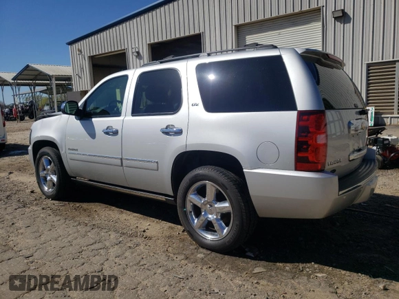 2013 Chevrolet Tahoe LTZ with VIN 1GNSCCE03DR374265, listed as a Copart auction lot 49290765 with 206,584 mi miles and Salvage title. Bid and sale history available at DreamBid. Image 2.